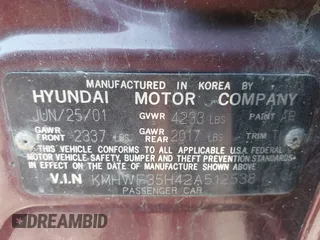 2002 Hyundai Sonata GLS with VIN KMHWF35H42A512538, listed as a IAAI auction lot 42000170 with 157,172 mi miles. Bid and sale history available at carsss.com. Image 9.