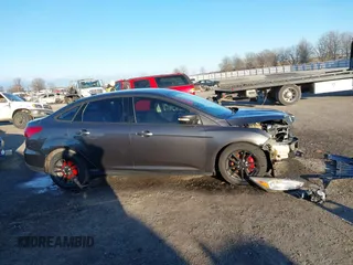 2015 Ford Focus SE with VIN 1FADP3F29FL384879, listed as a IAAI auction lot 41335839 with 107,871 mi miles. Bid and sale history available at carsss.com. Image 14.
