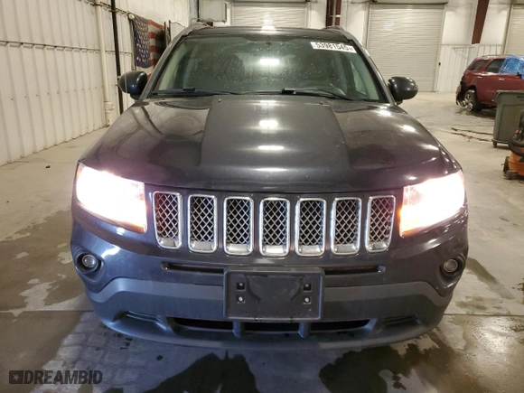2014 Jeep Compass Latitude with VIN 1C4NJDEB1ED665042, listed as a Copart auction lot 53981545 with 171,299 mi miles and Clean Title. Bid and sale history available at carsss.com. Image 5.