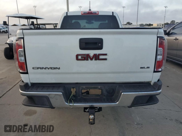 2015 GMC Canyon 2WD SLE with VIN 1GTH5BEA2F1131855, listed as a Copart auction lot 83924504 with 0 mi miles and Salvage Title. Bid and sale history available at carsss.com. Image 6.