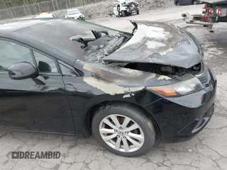 2012 Honda Civic EX with VIN 2HGFB2F84CH316659, listed as a IAAI auction lot 42217190 with 124,198 mi miles and . Bid and sale history available at DreamBid. Image 13.