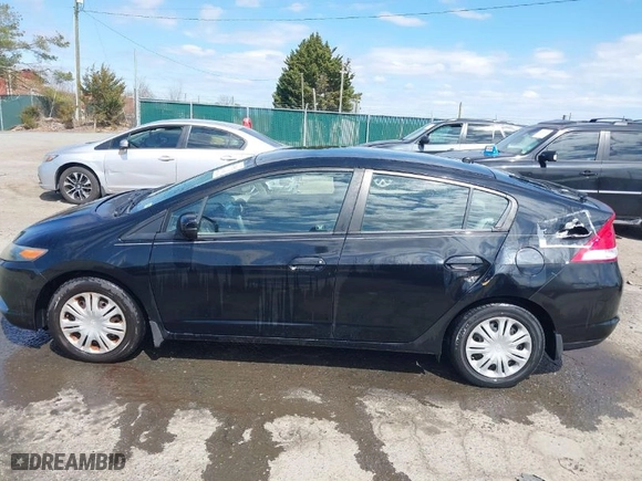 2010 Honda Insight LX with VIN JHMZE2H53AS031218, listed as a IAAI auction lot 41738562 with 96808 miles. Bid and sale history available at carsss.com. Image 13.
