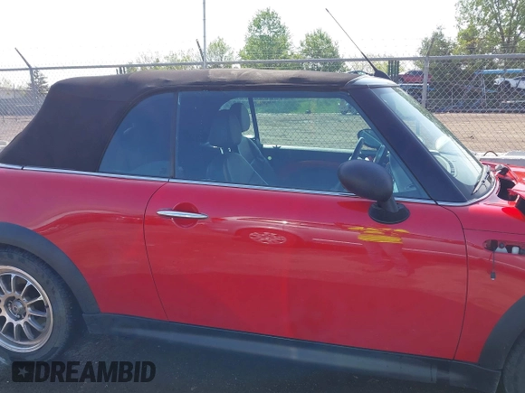 2006 MINI Convertible S with VIN WMWRH33596TK58563, listed as a IAAI auction lot 42210790 with 102,476 mi miles and . Bid and sale history available at DreamBid. Image 13.
