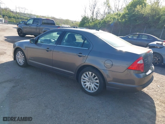 2011 Ford Fusion Hybrid with VIN 3FADP0L34BR290335, listed as a IAAI auction lot 42094674 with 171,391 mi miles. Bid and sale history available at carsss.com. Image 3.