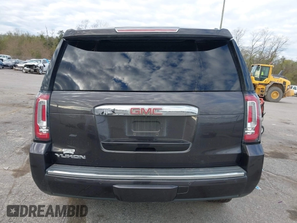 2017 GMC Yukon Denali with VIN 1GKS1CKJ0HR153941, listed as a IAAI auction lot 41300648 with 128,193 mi miles. Bid and sale history available at carsss.com. Image 16.