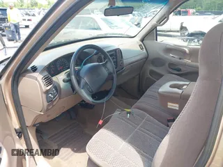 1997 Ford F-150 with VIN 1FTDF17W9VNA84250, listed as a IAAI auction lot 42149320 with 85,297 mi miles and . Bid and sale history available at DreamBid. Image 5.