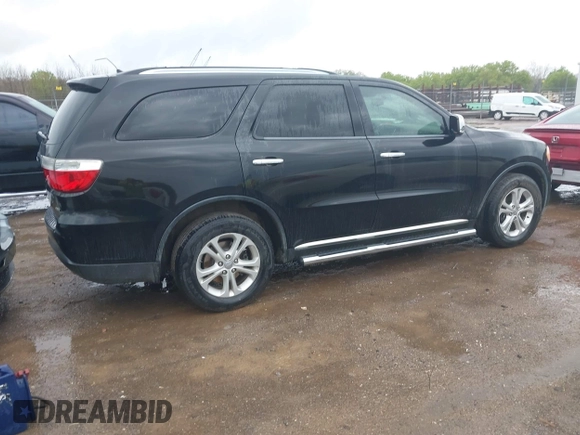 2013 Dodge Durango Crew with VIN 1C4RDHDG5DC613835, listed as a IAAI auction lot 41910643 with 155,827 mi miles and . Bid and sale history available at DreamBid. Image 4.