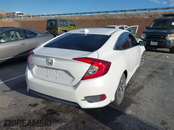2017 Honda Civic EX z VIN 2HGFC2F76HH573639, wystawiony jako IAAI lot #41807311 z przebiegiem 140 431 mil mil oraz . Historia ofert i sprzedaży dostępna na DreamBid. Obrazek 4.