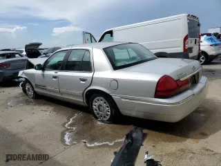 2003 Mercury Grand Marquis GS Convenience with VIN 2MEFM74W93X654361, listed as a Copart auction lot 63485294 with 165,569 mi miles and Salvage Title. Bid and sale history available at carsss.com. Image 2.