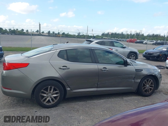 2013 Kia Optima LX z VIN 5XXGM4A74DG147688, wystawiony jako IAAI lot #42127503 z przebiegiem 148 705 mil mil oraz . Historia ofert i sprzedaży dostępna na DreamBid. Obrazek 13.