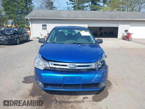 2010 Ford Focus SE with VIN 1FAHP3FNXAW159048, listed as a IAAI auction lot 42103062 with 142,810 mi miles. Bid and sale history available at carsss.com. Image 12.