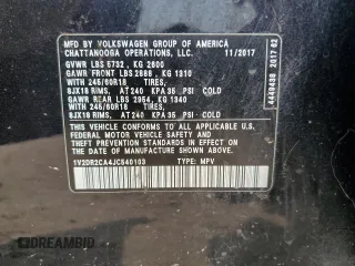 2018 Volkswagen Atlas SE z VIN 1V2DR2CA4JC540103, wystawiony jako Copart lot #58858405 z przebiegiem Nie podano mil oraz Szkoda całkowita • Salvage title. Historia ofert i sprzedaży dostępna na DreamBid. Obrazek 13.