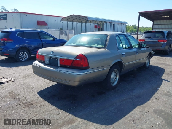 2002 Mercury Grand Marquis LS Premium with VIN 2MEFM75W52X667539, listed as a IAAI auction lot 42026715 with 189,985 mi miles and . Bid and sale history available at DreamBid. Image 4.