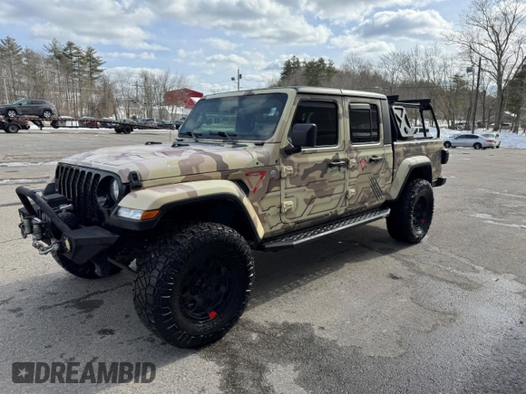 2021 Jeep Gladiator Willys with VIN 1C6HJTAG5ML526651, listed as a IAAI auction lot 41593639 with 162,543 mi miles. Bid and sale history available at carsss.com. Image 2.