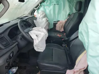 2022 Ford Transit Cargo z VIN 1FTBR1X8XNKA23913, wystawiony jako Copart lot #82981284 z przebiegiem Nie podano mil oraz Szkoda całkowita • Salvage title. Historia ofert i sprzedaży dostępna na DreamBid. Obrazek 5.