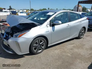 2022 Toyota Prius L Eco with VIN JTDKAMFU3N3190048, listed as a IAAI auction lot 41982252 with 19,189 mi miles. Bid and sale history available at carsss.com. Image 17.