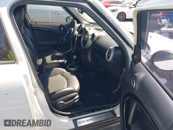 2012 MINI Countryman S with VIN WMWZC5C54CWM11869, listed as a IAAI auction lot 42265935 with 100,102 mi miles and . Bid and sale history available at DreamBid. Image 5.
