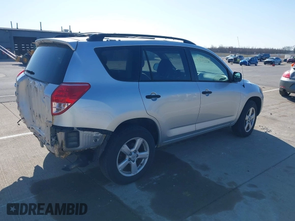 2006 Toyota RAV4 with VIN JTMBK33VX66000704, listed as a IAAI auction lot 41884109 with 256,711 mi miles. Bid and sale history available at carsss.com. Image 4.