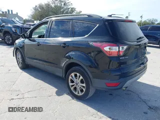 2017 Ford Escape SE with VIN 1FMCU0GDXHUB56573, listed as a IAAI auction lot 41694558 with 145,902 mi miles. Bid and sale history available at carsss.com. Image 3.