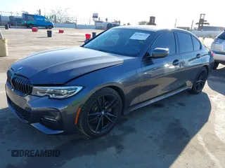 2021 BMW 3 Series 330i z VIN 3MW5R1J08M8B94401, wystawiony jako IAAI lot #41760747 z przebiegiem Nie podano mil oraz . Historia ofert i sprzedaży dostępna na DreamBid. Obrazek 2.