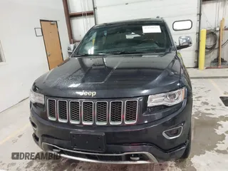 2014 Jeep Grand Cherokee Overland with VIN 1C4RJFCT9EC234270, listed as a IAAI auction lot 41938621 with 144,541 mi miles and . Bid and sale history available at DreamBid. Image 12.