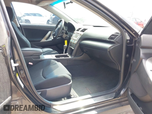 2009 Toyota Camry with VIN 4T1BE46K69U879189, listed as a IAAI auction lot 42088458 with 215,006 mi miles. Bid and sale history available at carsss.com. Image 5.