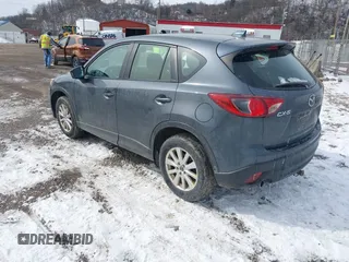 2013 Mazda CX-5 Sport z VIN JM3KE2BE9D0156274, wystawiony jako IAAI lot #41624466 z przebiegiem 159 017 mil mil oraz . Historia ofert i sprzedaży dostępna na DreamBid. Obrazek 3.