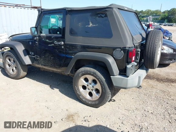 2009 Jeep Wrangler X with VIN 1J4FA24179L711352, listed as a IAAI auction lot 42577898 with 133,309 mi miles and . Bid and sale history available at DreamBid. Image 3.