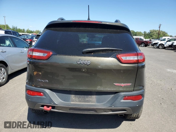 2015 Jeep Cherokee Trailhawk with VIN 1C4PJMBS8FW513391, listed as a Copart auction lot 64633115 with 115,406 mi miles and Clean title. Bid and sale history available at DreamBid. Image 6.