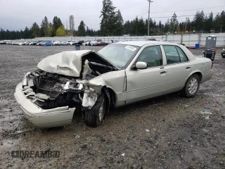 2005 Mercury Grand Marquis LS Premium z VIN 2MEFM75WX5X651227, wystawiony jako Copart lot #52056805 z przebiegiem 95 672 mil mil oraz Szkody całkowita. Historia ofert i sprzedaży dostępna na DreamBid. Obrazek 1.