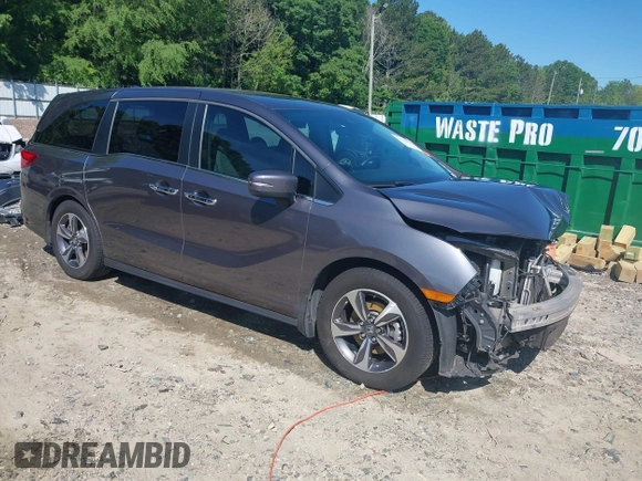 2020 Honda Odyssey Touring z VIN 5FNRL6H84LB001511, wystawiony jako IAAI lot #42194828 z przebiegiem 218 269 mil mil oraz . Historia ofert i sprzedaży dostępna na DreamBid. Obrazek 1.
