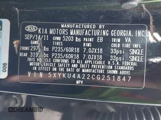2012 Kia Sorento EX with VIN 5XYKU4A22CG251847, listed as a IAAI auction lot 42014433 with 166,186 mi miles. Bid and sale history available at carsss.com. Image 9.