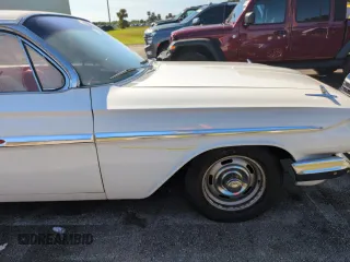 1961 Chevrolet Impala с VIN 11739B190181, выставлен на аукционе Copart как лот 75408464 с пробегом 85 386 миль миль и Списание • Salvage title. История ставок и продаж доступна на DreamBid. Изображение 12.