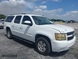 2009 Chevrolet Suburban LT w/2LT with VIN 1GNFC26JX9J108623, listed as a IAAI auction lot 42115456 with 144,370 mi miles. Bid and sale history available at carsss.com. Image 1.