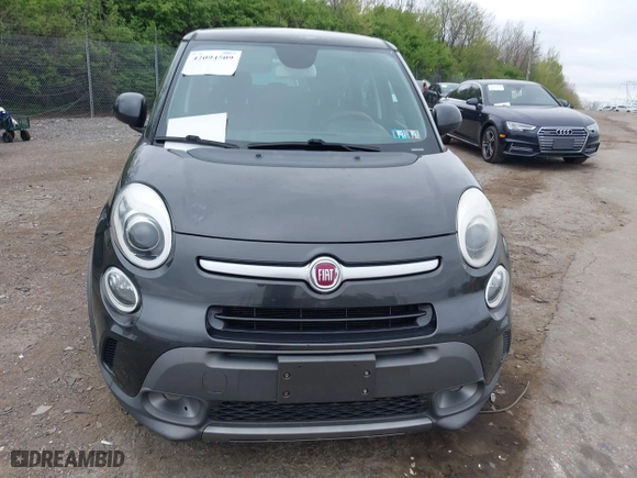 2014 FIAT 500L Trekking with VIN ZFBCFADHXEZ011031, listed as a IAAI auction lot 42094509 with 74,132 mi miles. Bid and sale history available at carsss.com. Image 6.