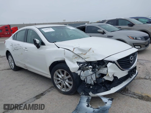 2015 Mazda Mazda6 i Sport with VIN JM1GJ1U68F1170884, listed as a IAAI auction lot 39229424 with 99,317 mi miles. Bid and sale history available at carsss.com. Image 1.
