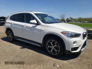 2019 BMW X1 xDrive28i with VIN WBXHT3C51K3H35953, listed as a Copart auction lot 54751675 with 54,802 mi miles and Salvage title. Bid and sale history available at DreamBid. Image 4.