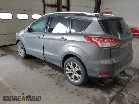 2014 Ford Escape Titanium with VIN 1FMCU9J90EUC31625, listed as a IAAI auction lot 41492075 with 301,917 mi miles and . Bid and sale history available at DreamBid. Image 3.