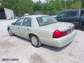 2004 Mercury Grand Marquis LS Premium with VIN 2MEFM75W14X649140, listed as a IAAI auction lot 42095663 with 88,896 mi miles. Bid and sale history available at carsss.com. Image 3.