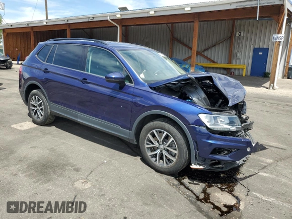 2021 Volkswagen Tiguan S with VIN 3VV1B7AX7MM036467, listed as a Copart auction lot 56992555 with 12,008 mi miles and Salvage title. Bid and sale history available at DreamBid. Image 4.