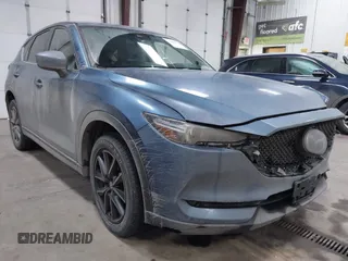 2018 Mazda CX-5 Grand Touring with VIN JM3KFBDM4J1342487, listed as a IAAI auction lot 41468856 with 163,072 mi miles and . Bid and sale history available at DreamBid. Image 1.