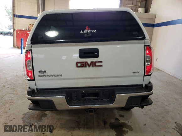 2017 GMC Canyon 4WD SLT with VIN 1GTP6DE12H1250996, listed as a Copart auction lot 44370305 with 93,935 mi miles and Salvage Title. Bid and sale history available at carsss.com. Image 6.