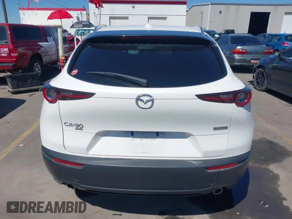 2024 Mazda CX-30 S Premium with VIN 3MVDMBDM8RM633580, listed as a IAAI auction lot 42152915 with 18,679 mi miles and . Bid and sale history available at DreamBid. Image 16.