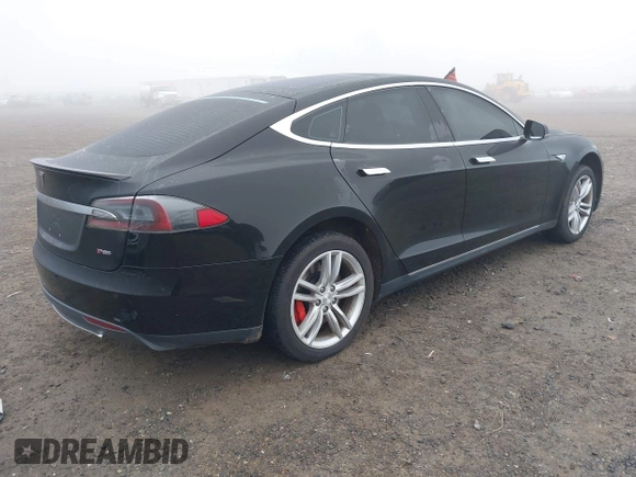 2014 Tesla Model S 60 with VIN 5YJSA1H1XEFP36008, listed as a IAAI auction lot 41287240 with 48,171 mi miles and . Bid and sale history available at DreamBid. Image 4.