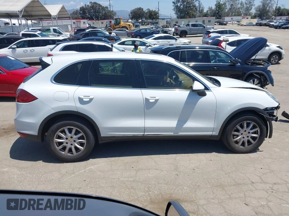 2012 Porsche Cayenne with VIN WP1AA2A22CLA08941, listed as a IAAI auction lot 42152243 with 120,122 mi miles and . Bid and sale history available at DreamBid. Image 14.