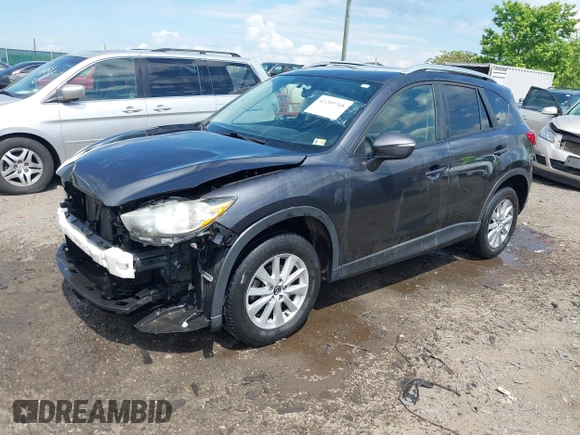 2015 Mazda CX-5 Touring with VIN JM3KE4CY9F0506879, listed as a IAAI auction lot 42209768 with 87,690 mi miles and . Bid and sale history available at DreamBid. Image 18.