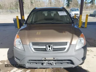 2002 Honda CR-V LX z VIN JHLRD78512C007757, wystawiony jako IAAI lot #41885302 z przebiegiem 177 892 mil mil oraz . Historia ofert i sprzedaży dostępna na DreamBid. Obrazek 12.