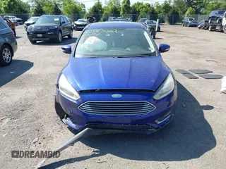 2015 Ford Focus Titanium z VIN 1FADP3N25FL291844, wystawiony jako IAAI lot #42383067 z przebiegiem 82 545 mil mil oraz . Historia ofert i sprzedaży dostępna na DreamBid. Obrazek 12.