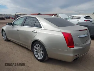 2014 Cadillac CTS Luxury RWD with VIN 1G6AR5SX6E0132580, listed as a IAAI auction lot 41349654 with 113,157 mi miles. Bid and sale history available at carsss.com. Image 3.