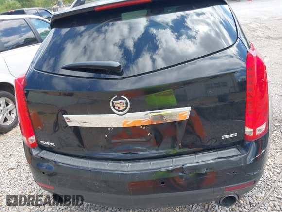 2013 Cadillac SRX Performance Collection z VIN 3GYFNDE35DS555248, wystawiony jako IAAI lot #42001494 z przebiegiem 268 410 mil mil oraz . Historia ofert i sprzedaży dostępna na DreamBid. Obrazek 16.